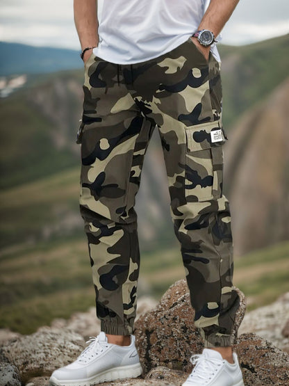 🛠️👖 Pantaloni de lucru rezistenți, de tip tactic – amestec de nailon și bumbac, cu numeroase buzunare funcționale, ideali pentru munca în aer liber 🌲
