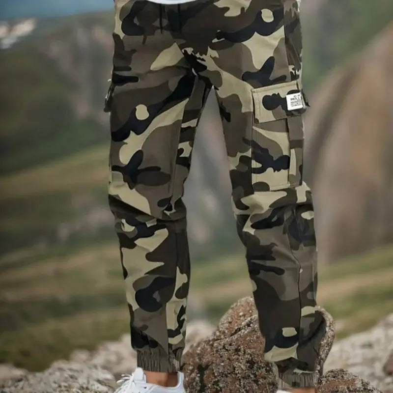 🛠️👖 Pantaloni de lucru rezistenți, de tip tactic – amestec de nailon și bumbac, cu numeroase buzunare funcționale, ideali pentru munca în aer liber 🌲
